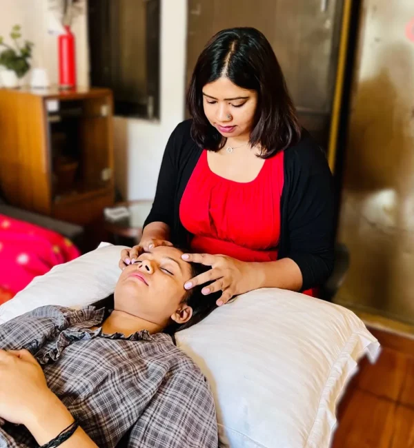 Participant receiving Access Bars during a workshop at The Healing Room